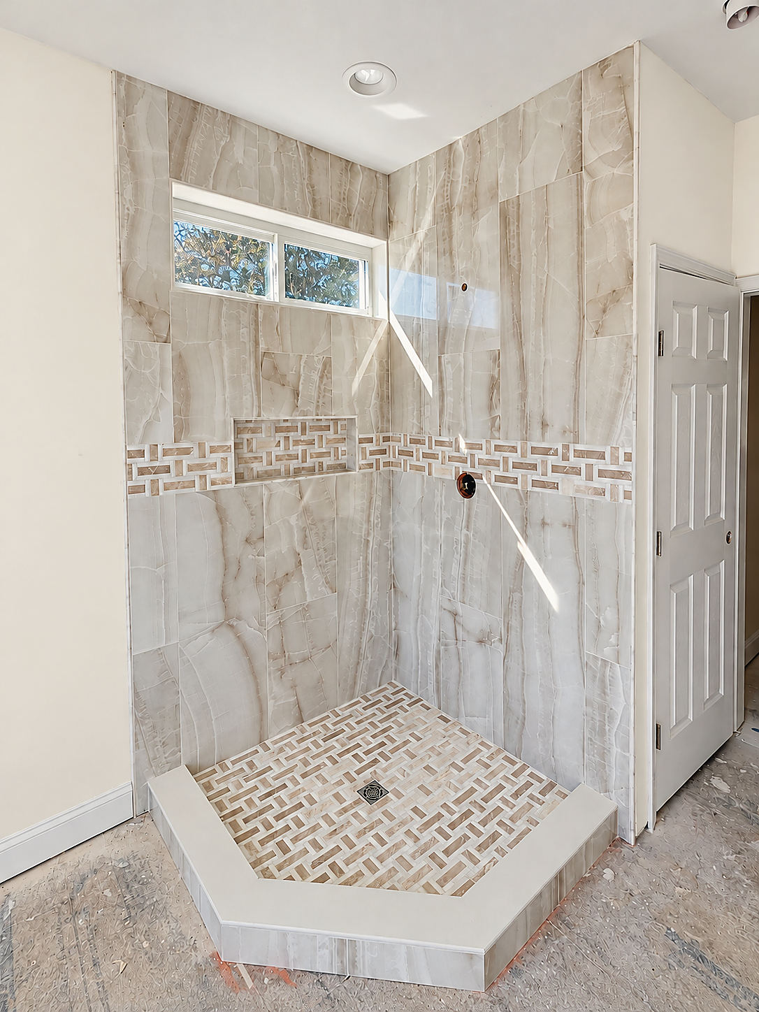 A Del Mar bathroom: a custom tiled walk-in shower