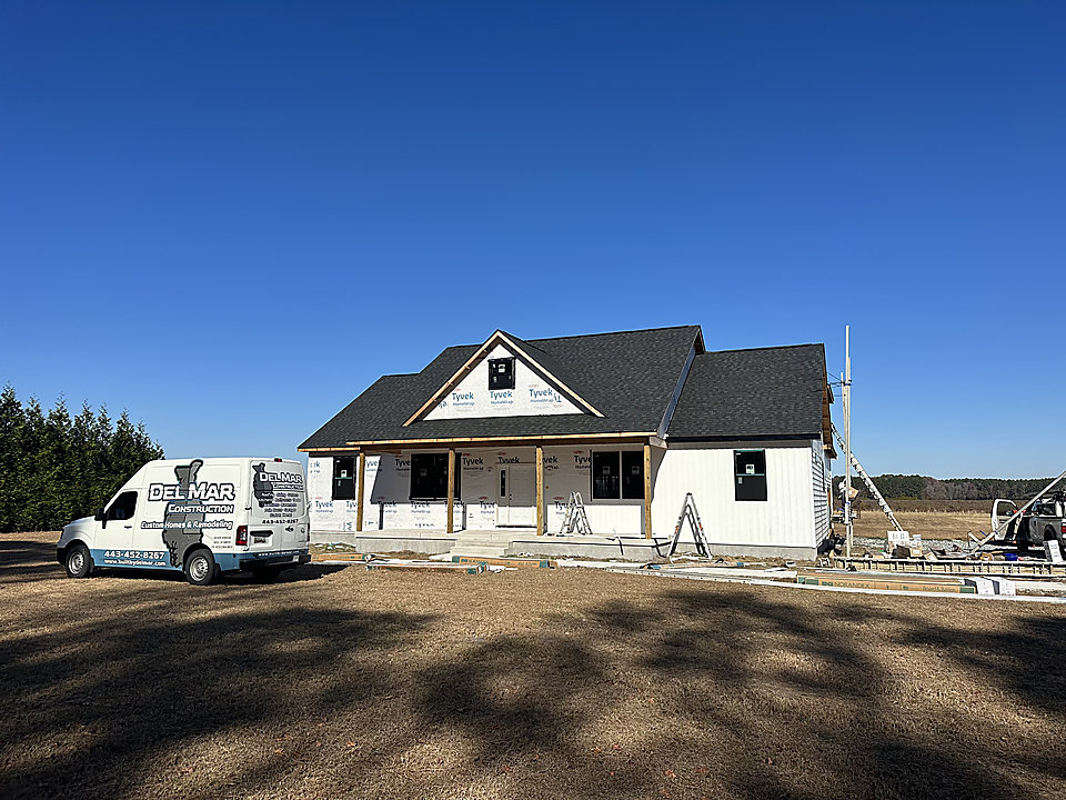 A new home going up with the Del Mar van on site