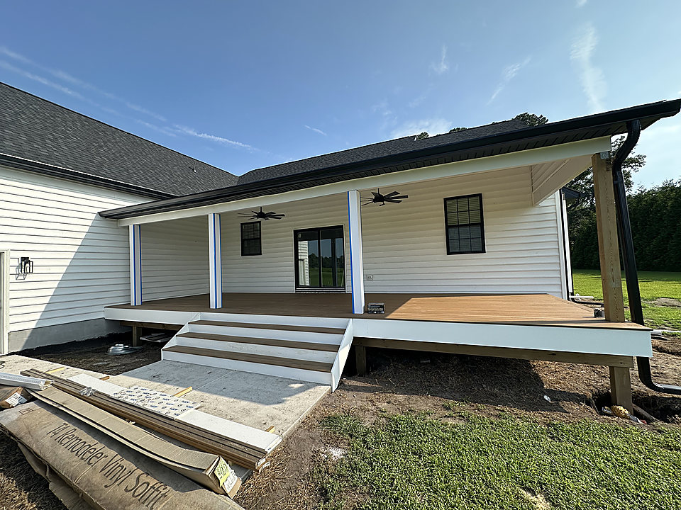 Seamless gutters and downspout on a new porch