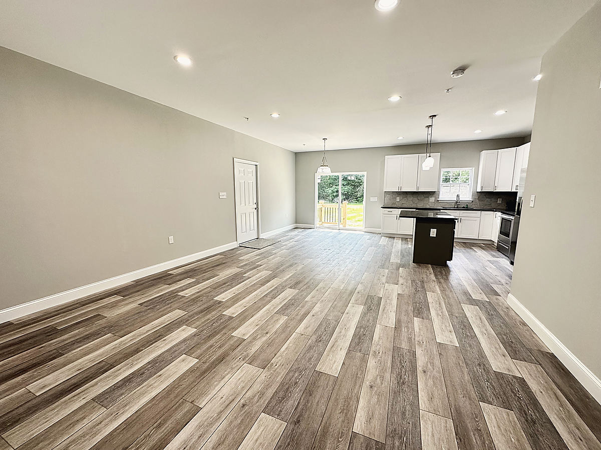 A custom home in Trappe: a living room with luxury vinyl plank floors