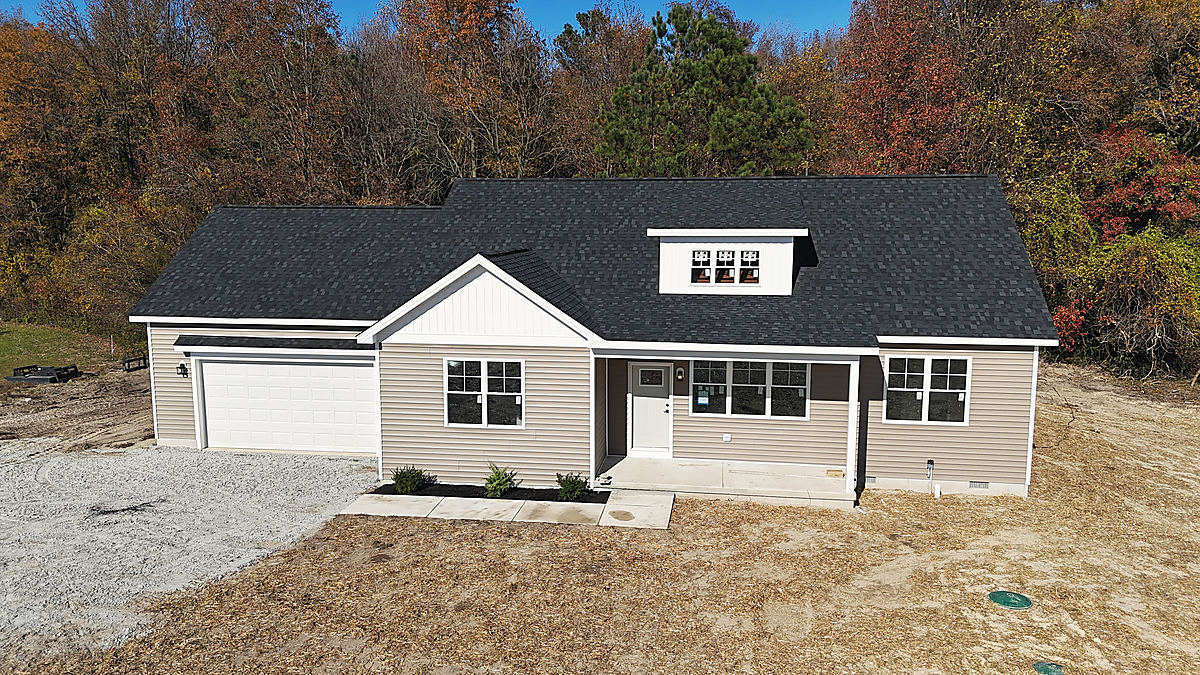 A custom home in Preston: a finished white home from above