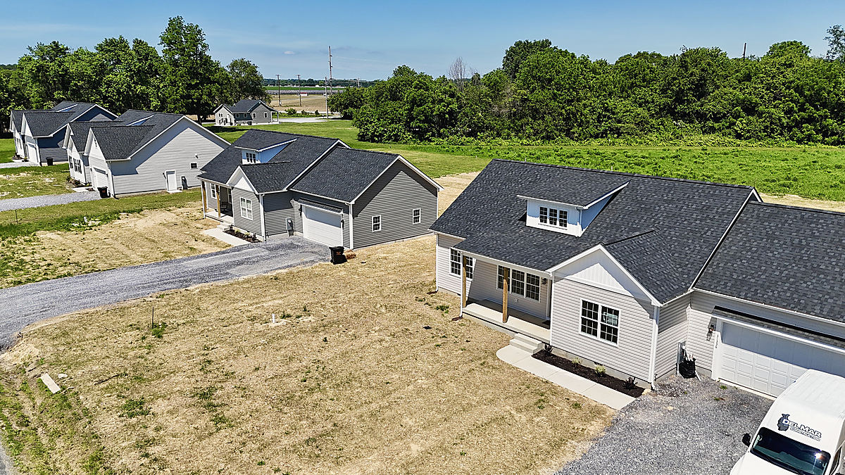 Four custom homes in Cordova: a new home from above, with the Del Mar van