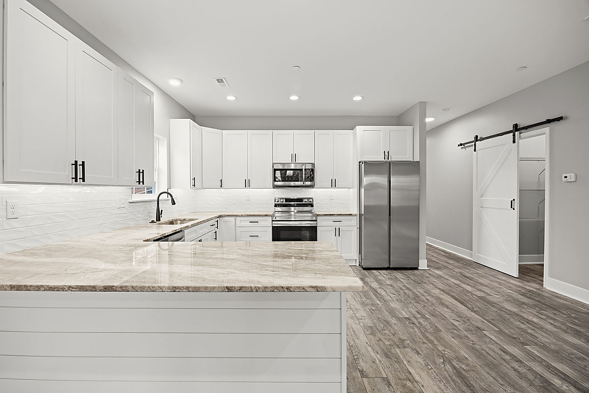 A custom home in Trappe: a white kitchen