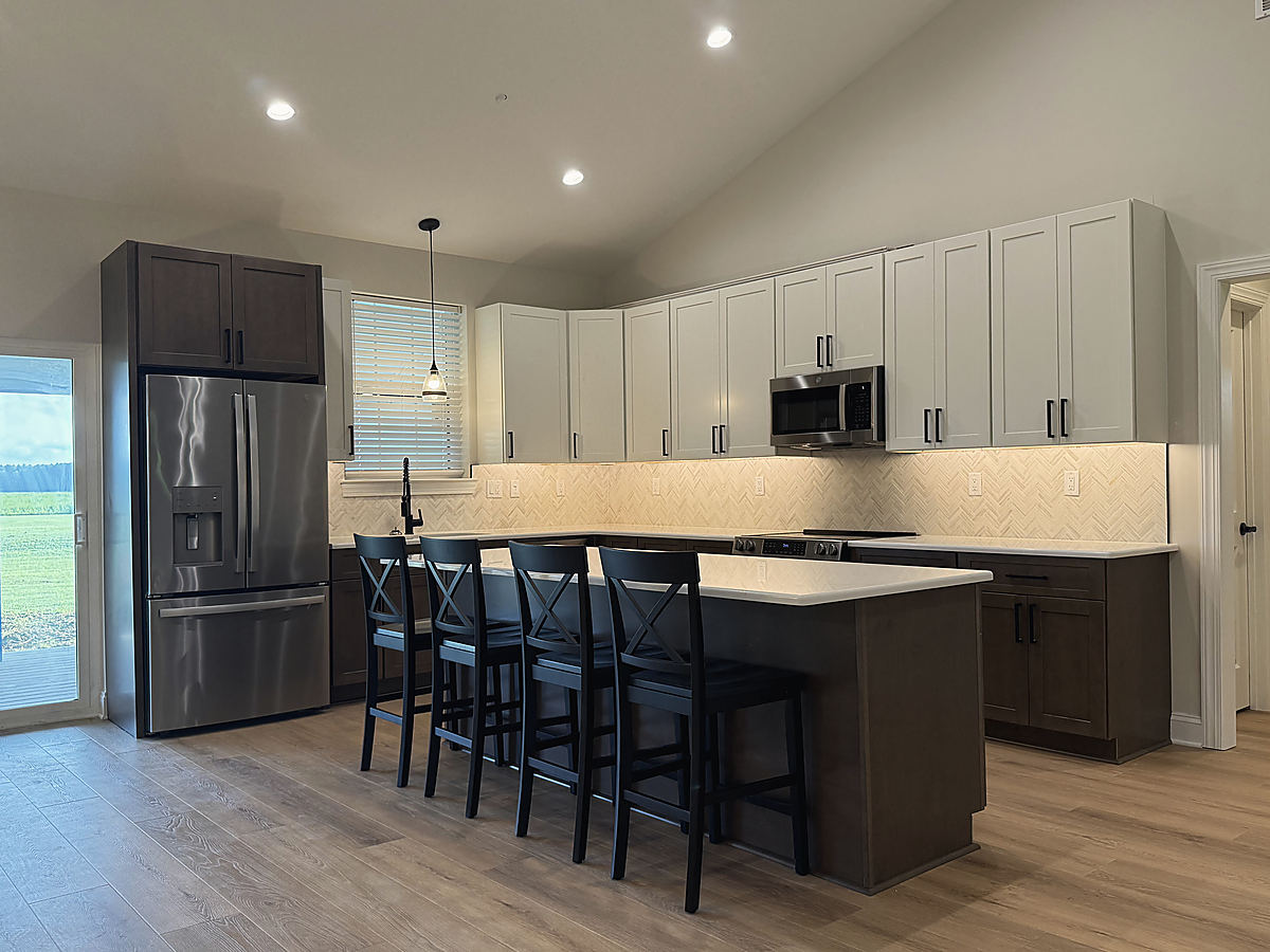 A custom home in Whaleyville: the kitchen island with seating