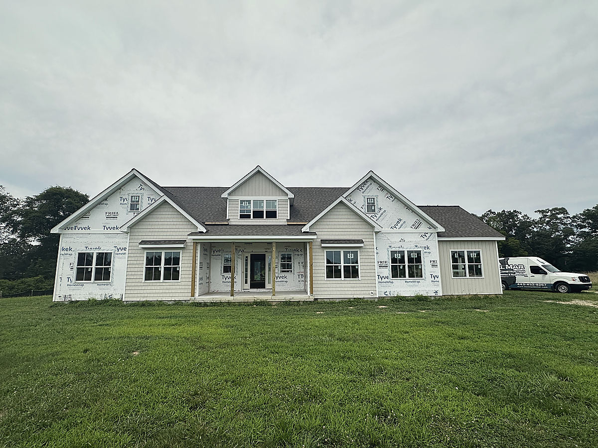 Under construction in Easton: the framed house from the front