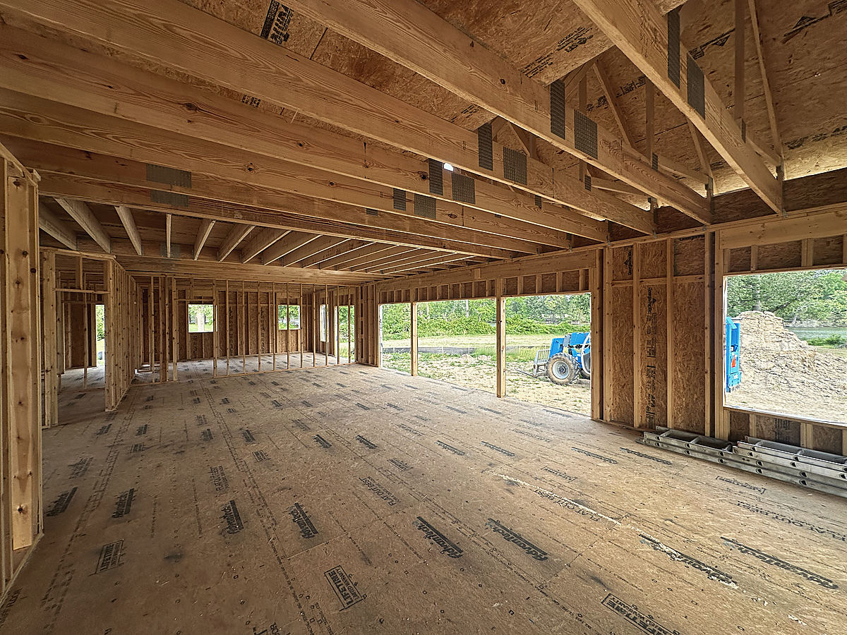 Under construction in Easton: roof trusses from inside the frame