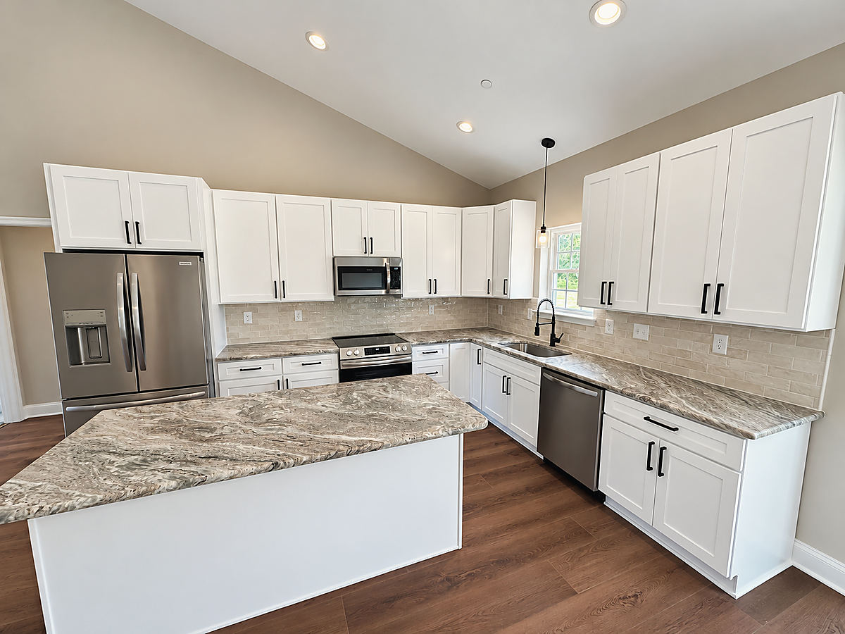 A Del Mar kitchen: a kitchen with a granite island