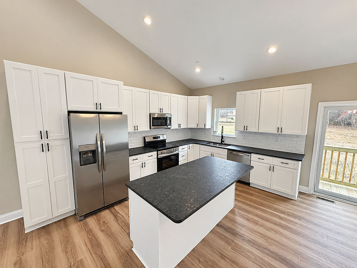 A Del Mar kitchen: a white kitchen with dark counters