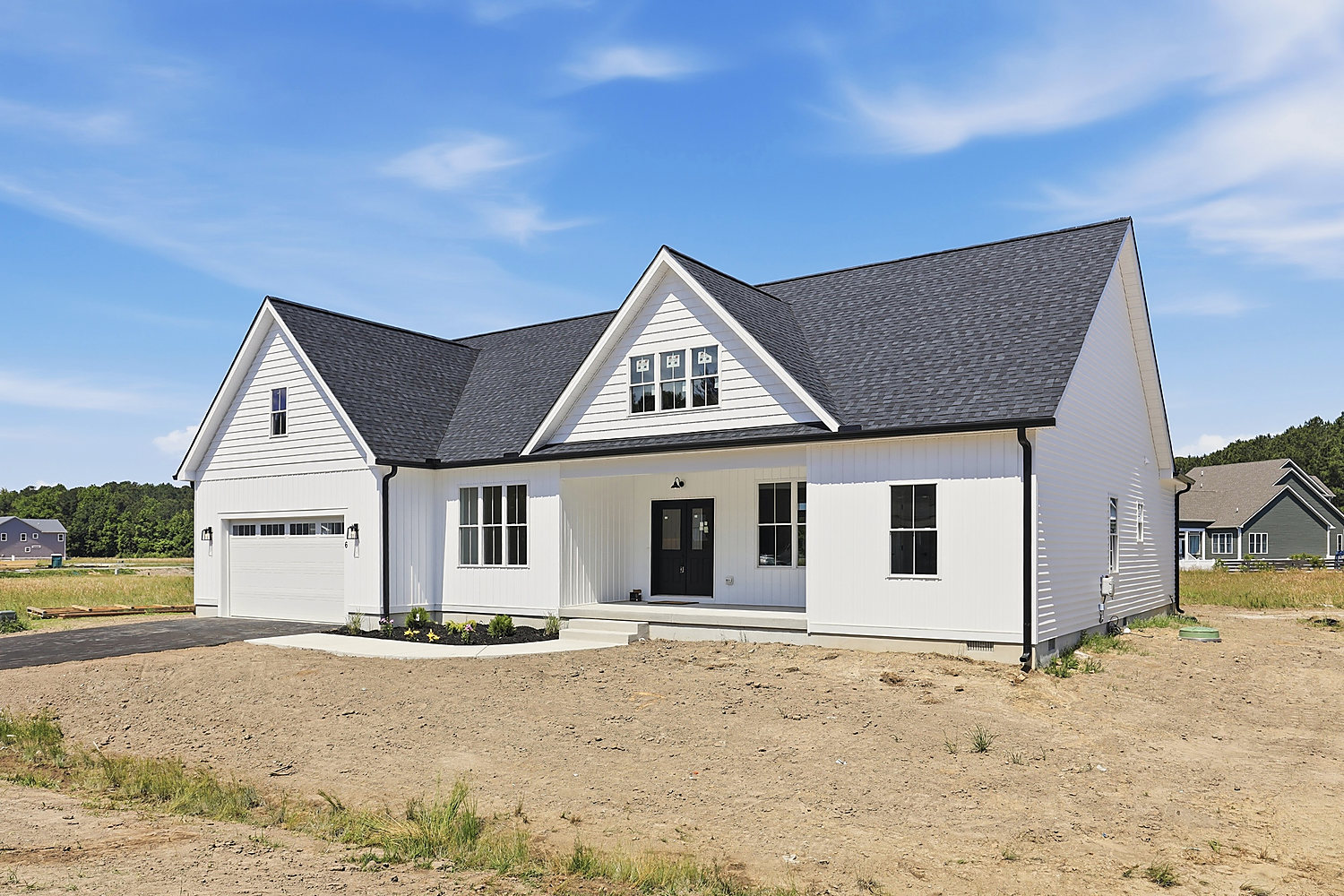 6 Preakness Drive, Berlin: a single-level coastal ranch with white board-and-batten siding and a covered front porch