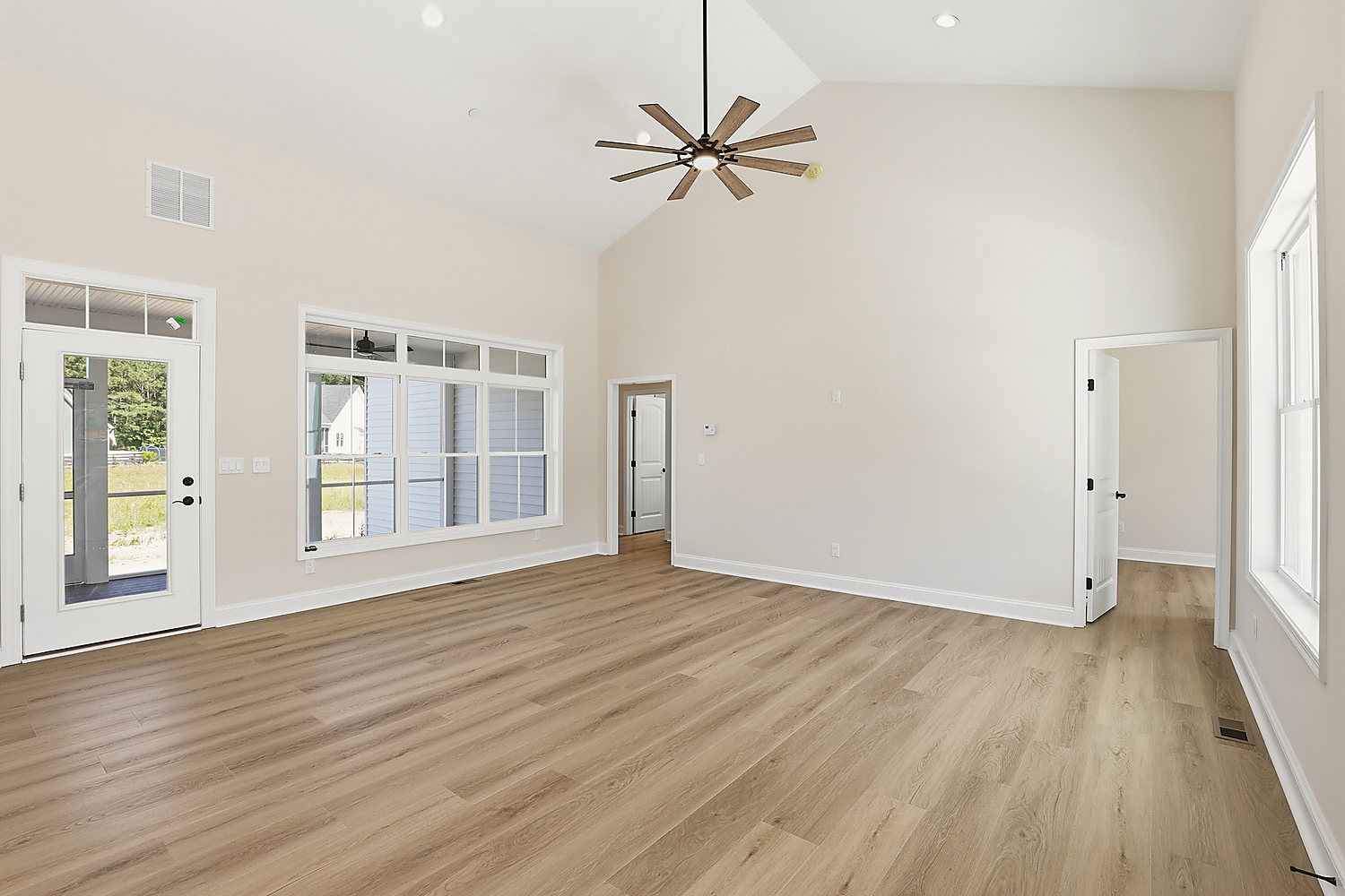 The living room at 6 Preakness Drive under a vaulted ceiling
