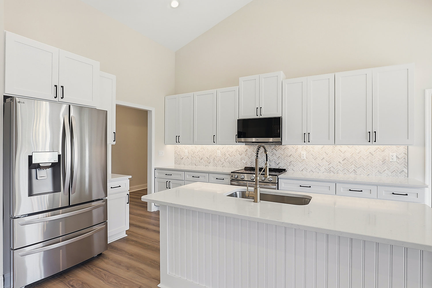 The kitchen at 5 Seattle Slew Lane: quartz counters and a large center island