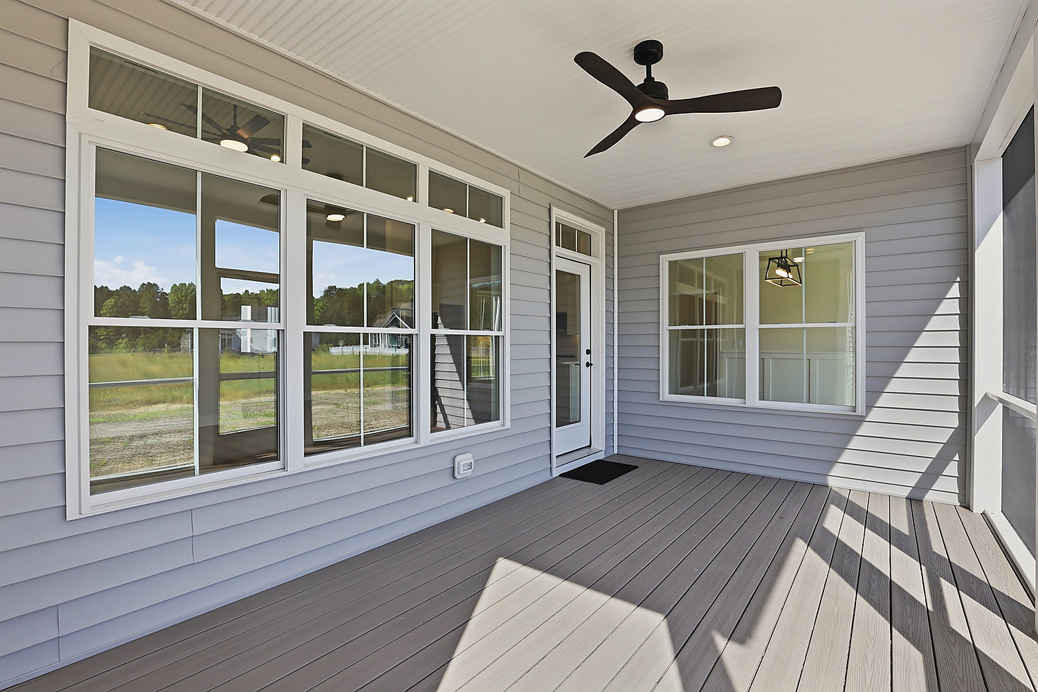 The screened rear porch at 5 Seattle Slew Lane