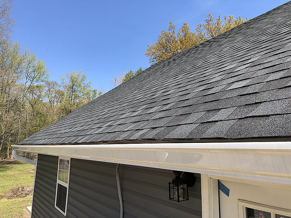 New architectural shingles over new siding on a Del Mar home