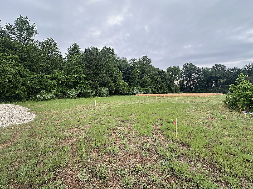 A staked-out lot in Preston before the first scoop of dirt