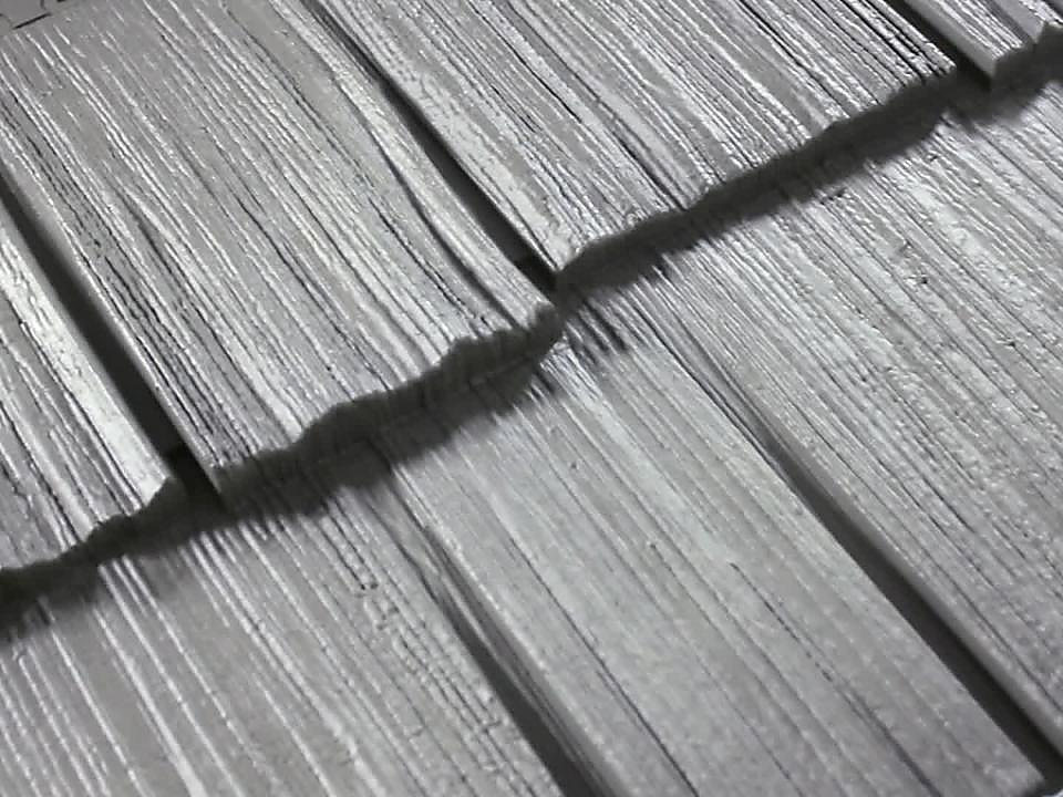 Close view of shake-style siding